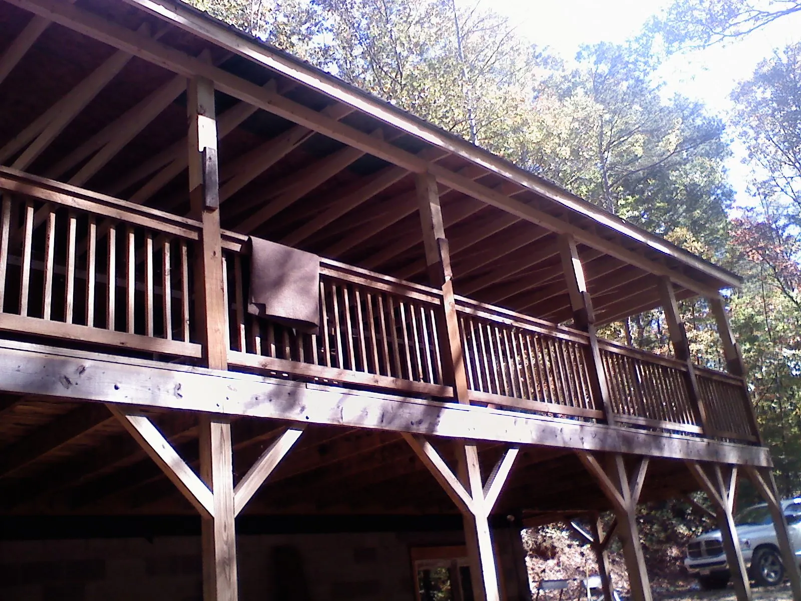 Timber framing under a new elevated porch and deck — Roof Leak Repair in Lehigh by Roofing Brothers